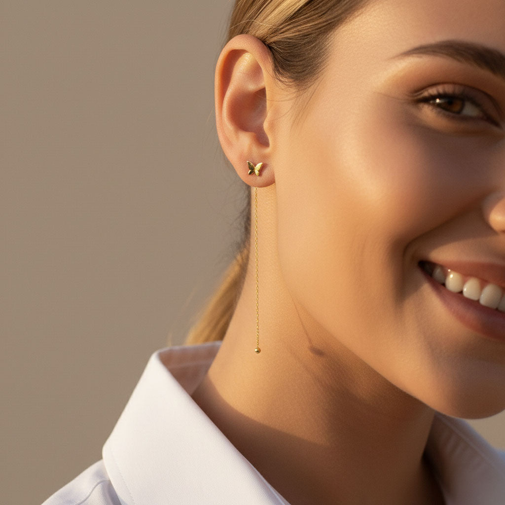 Aimeé – Earrings with tassel design and butterfly