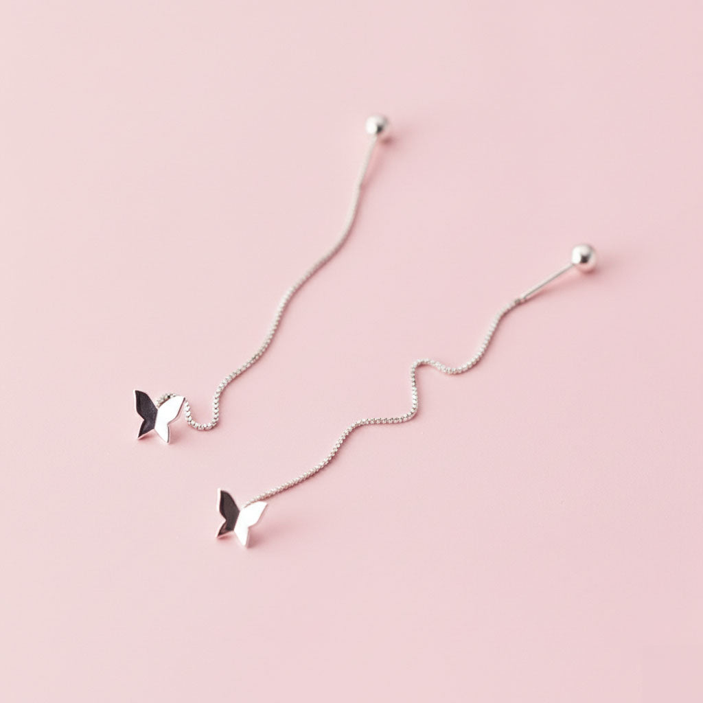 Aimeé – Earrings with tassel design and butterfly