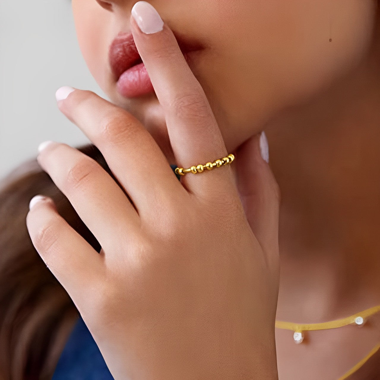 Move - Anti-Stress-Ring mit rotierenden Perlen