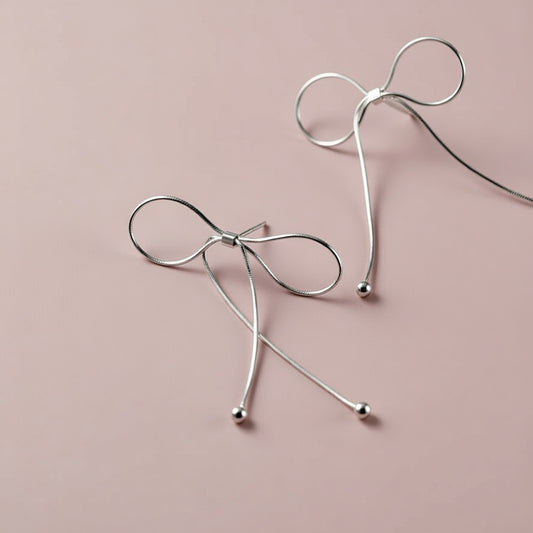 Rosie – Earrings with bow motif