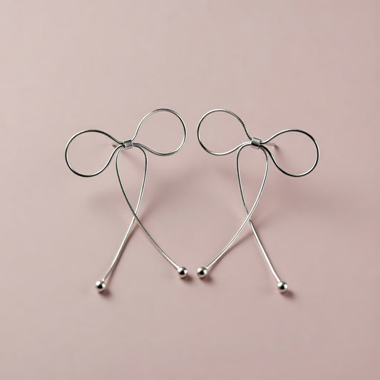Rosie – Earrings with bow motif