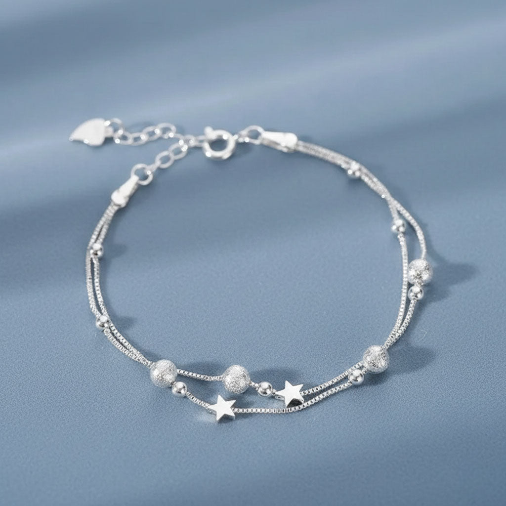 Nova - Armband mit Doppelketten und kosmischem Motiv