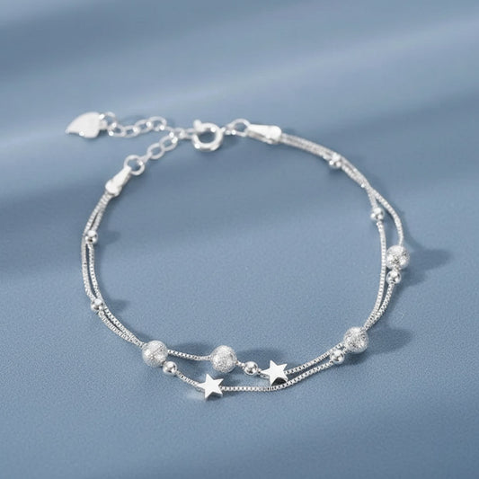 Nova – Bracelet with double chains and cosmic motif