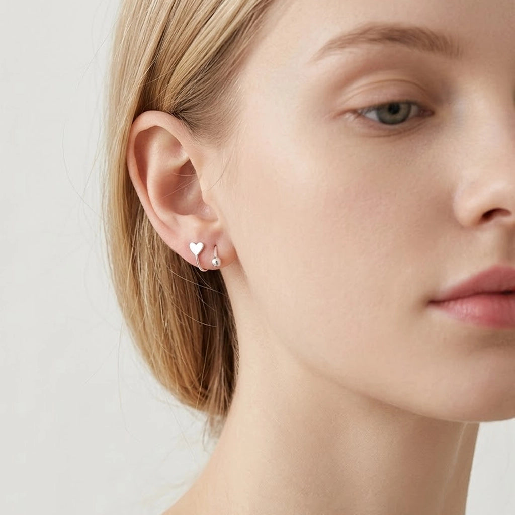 Twisted Heart & Star – Earrings with twisted design