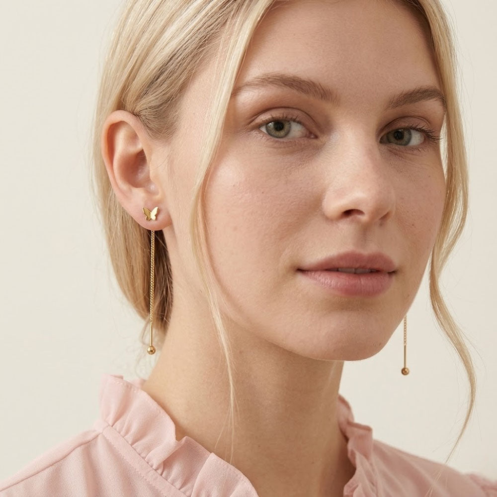 Aimeé – Earrings with tassel design and butterfly