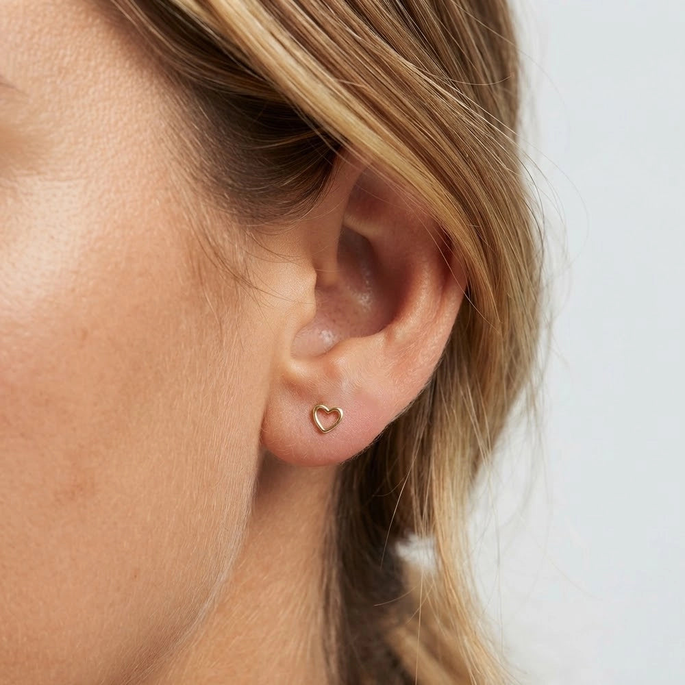 Endless Love – Stud earrings with hollow heart and screw backs