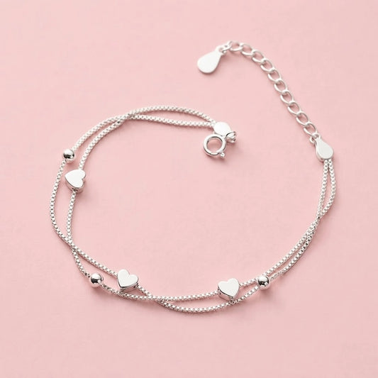 Evelyn – Bracelet with double chains and small hearts
